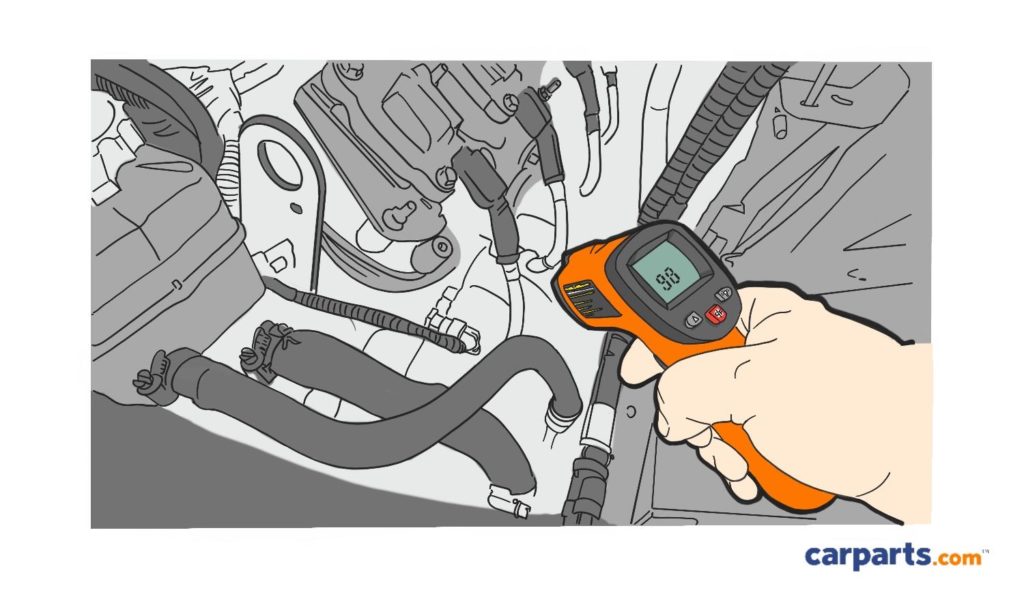 using temperature gun to check if the thermostat or radiator is bad