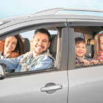 family inside an SUV