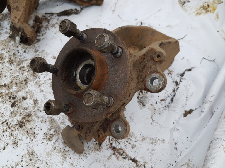 How to Replace a Wheel Hub In The Garage with