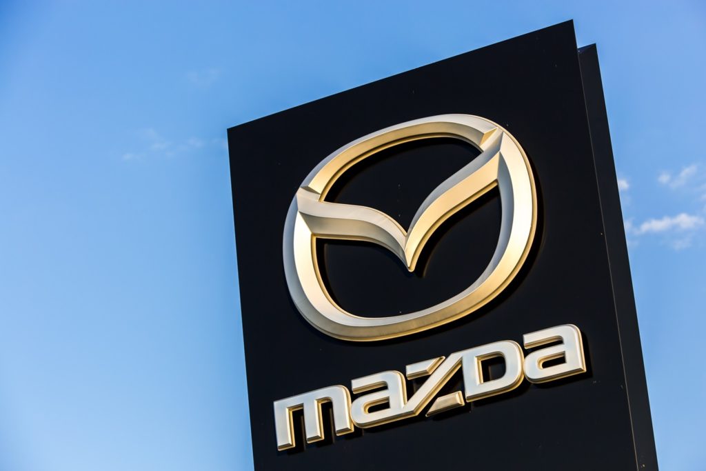 Mazda logo on dealership building