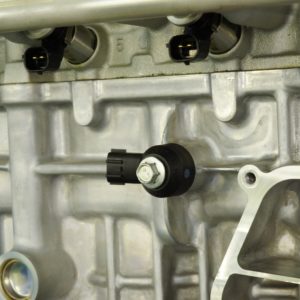 knock sensor installed on an engine block