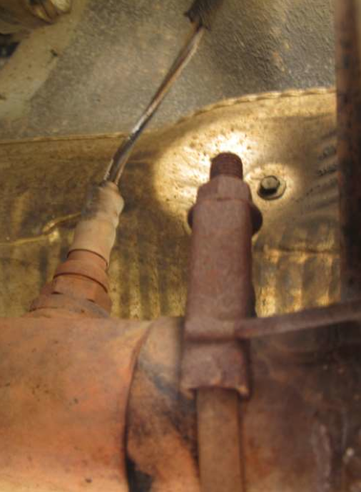 Stock exhaust clamp in front of the stock muffler.