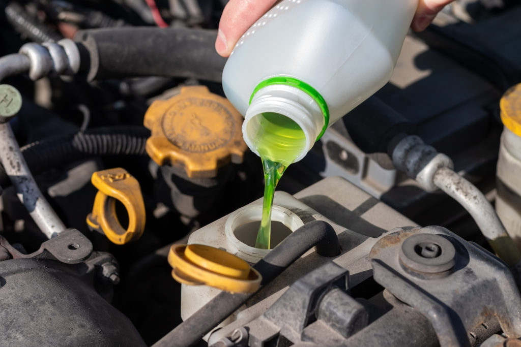 adding coolant to old car engine
