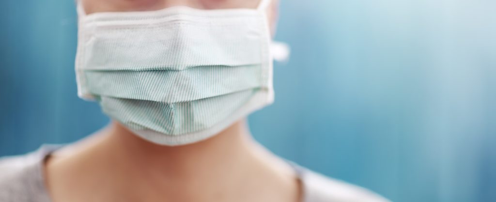 Health worker wearing medical mask