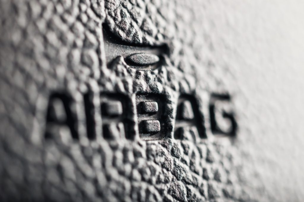 Airbag label on steering wheel