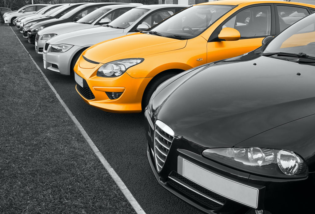 cars for sale in a parking lot