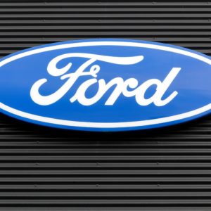 ford logo on gray wall