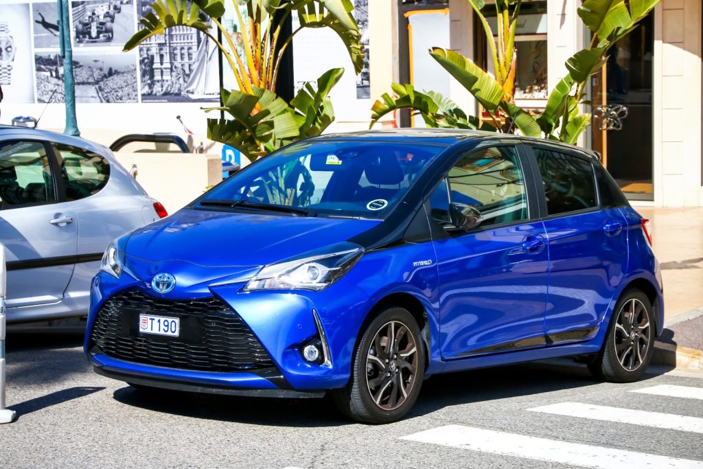 Blue Toyota Yaris parked outside