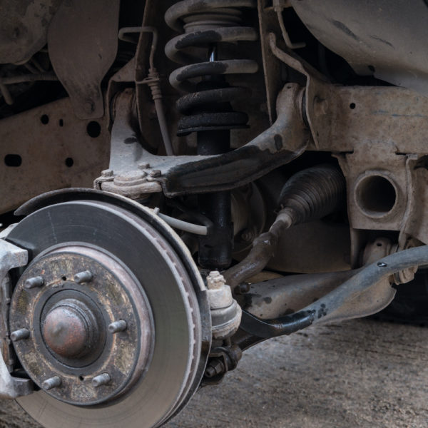 Shocks and Struts Replacement Cost In The Garage with