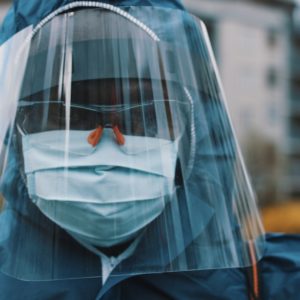 healthcare worker wearing face shield