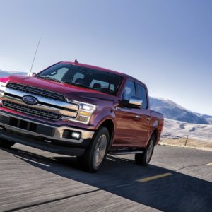red 2020 ford f 150 on the road
