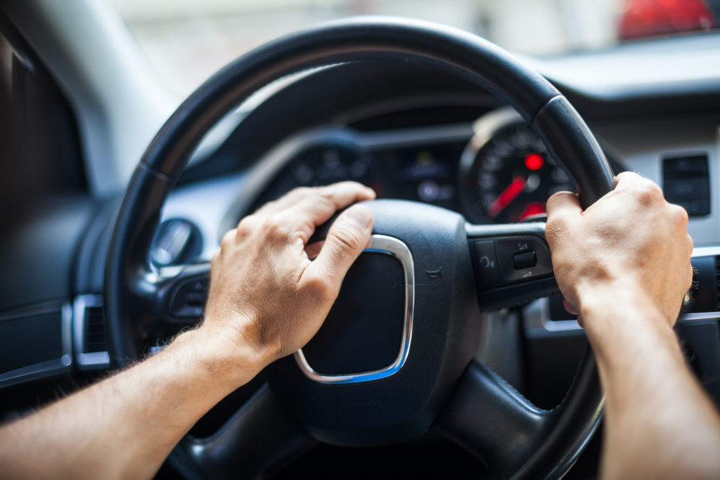 drivers hand on the car horn