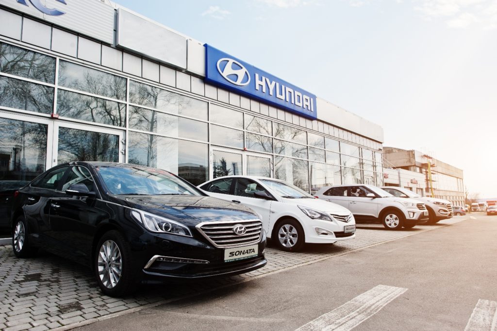 hyundai cars outside hyundai dealership building
