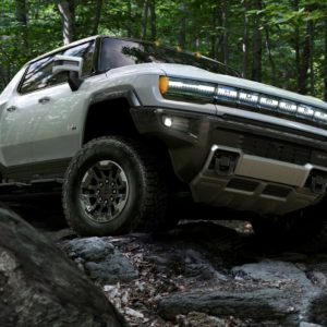2022 gmc hummer ev on rocky path
