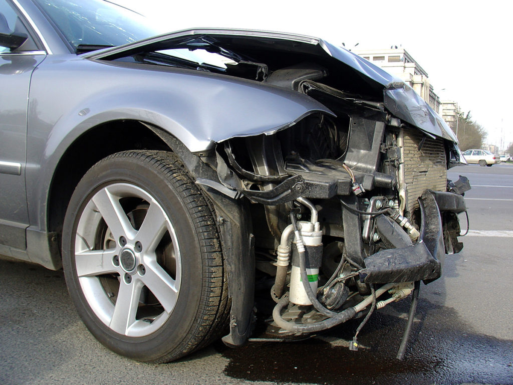 damage from front end car accident
