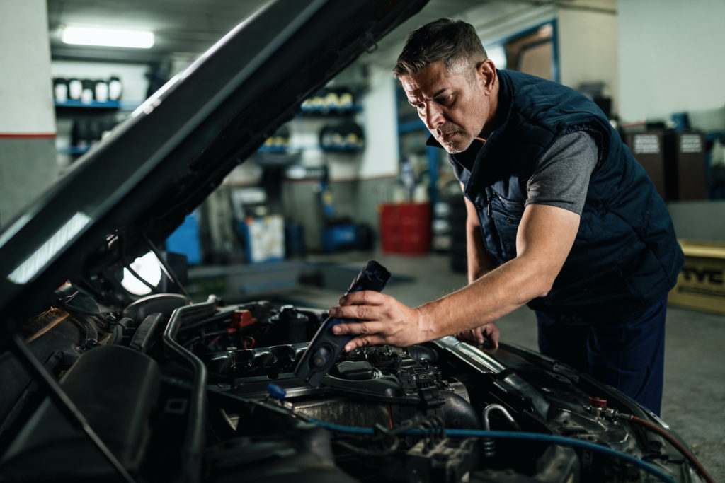 mechanic working on a car
