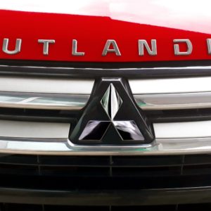 closeup of mitsubishi oulander emblem