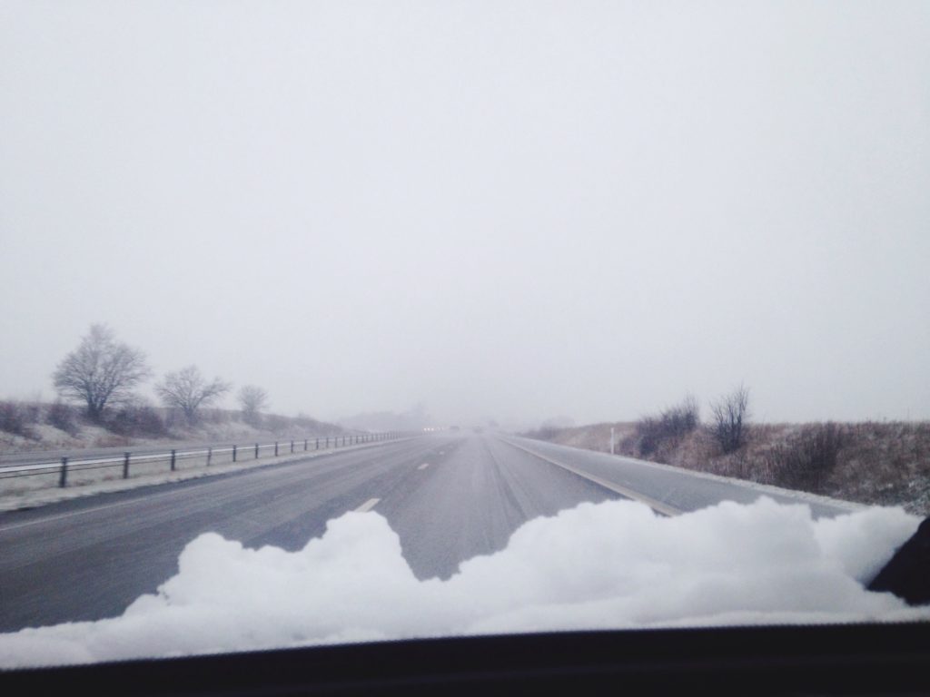 snow on car windshield