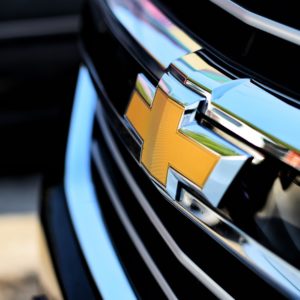closeup of chevy logo on car grille