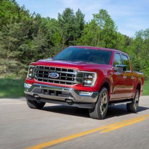 red 2021 ford f 150 on the road