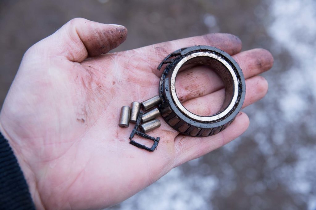 an old bearing on a male hand