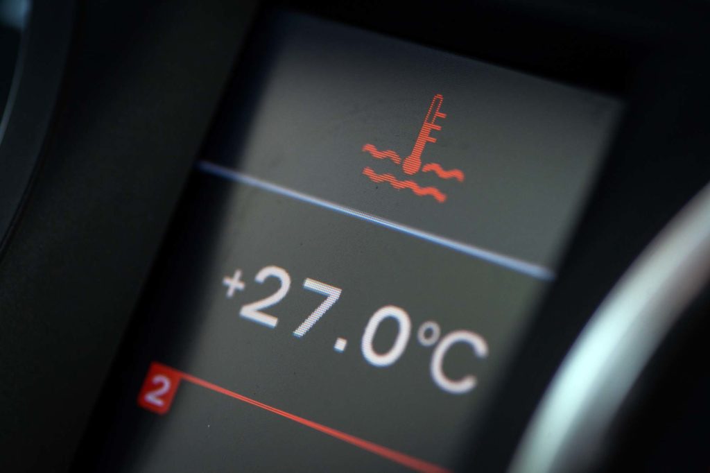 car electronic dashboard showing coolant temperature