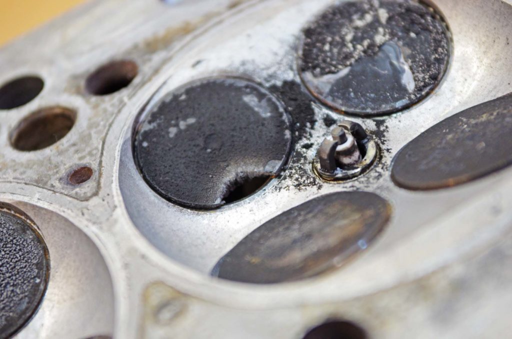 Burnt Valve Symptoms, Causes, Replacement Cost, & FAQ In The Garage