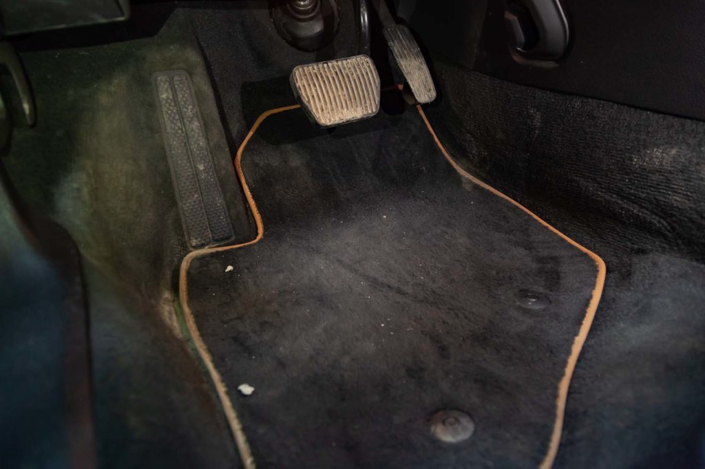 dirty car black carpet