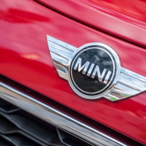 mini logo on red mini cooper