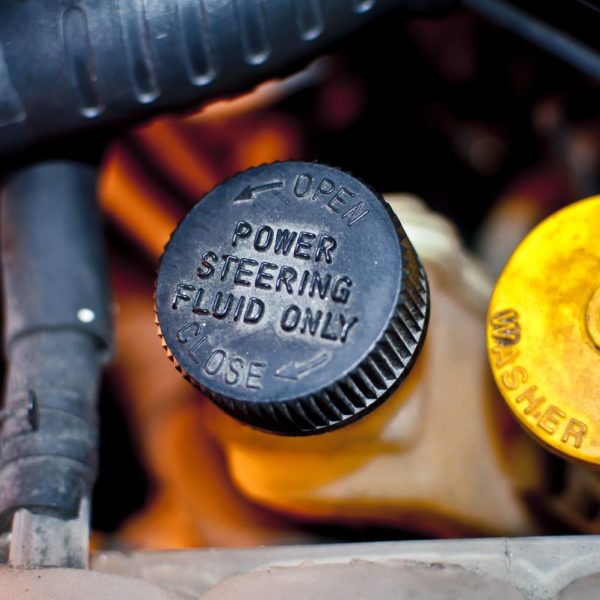 Where Is the Power Steering Fluid Located? In The Garage with