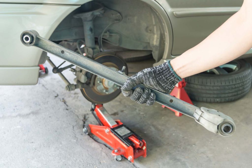 car rear trailing arm on hand