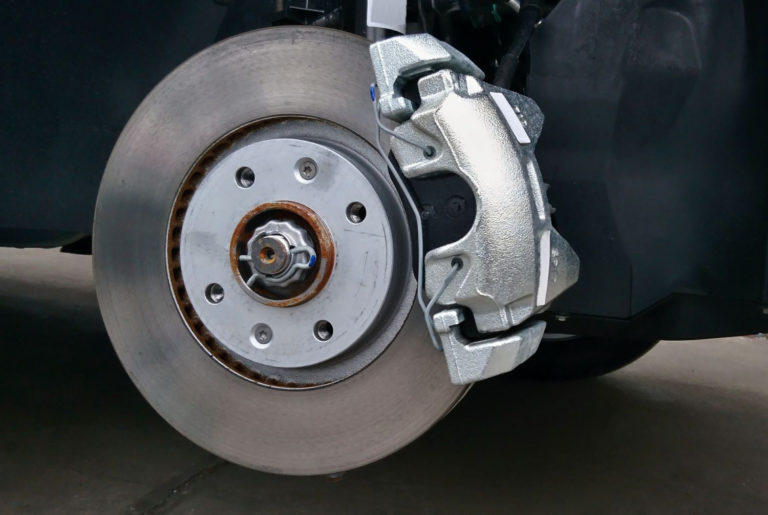 Why Is My Brake Caliper Sticking? In The Garage with