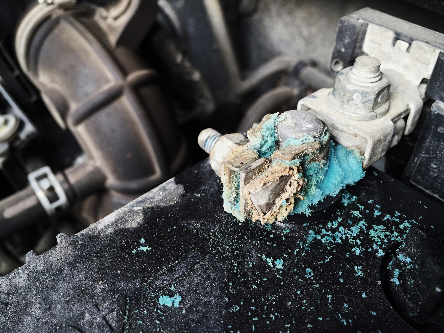 How to Spot and Prevent a Corroded Car Battery In The Garage with