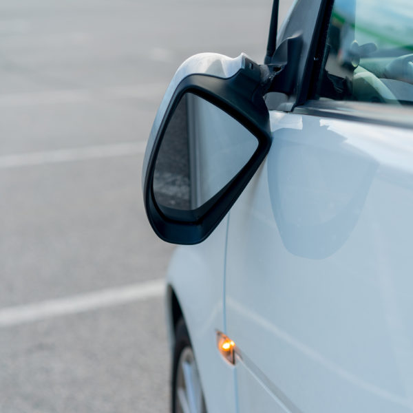 Is it Illegal to Drive Without a Side Mirror? In The Garage with