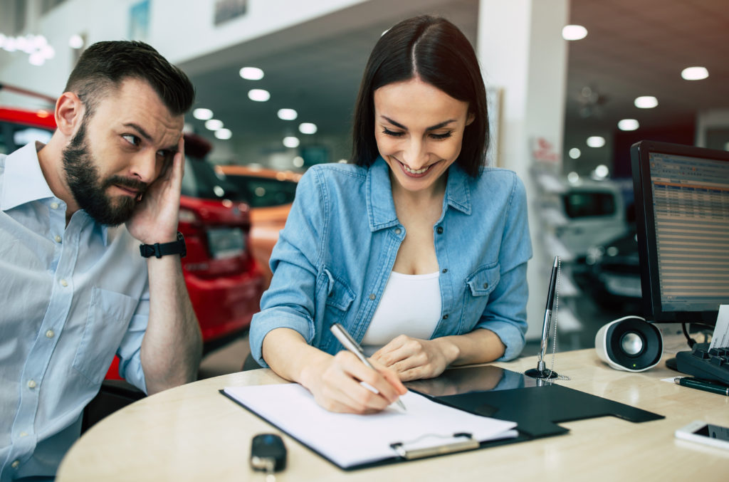 signing purchase agreement unhappy look