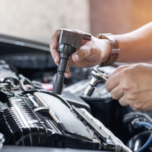 mechanic holds ignition coil p0358 code