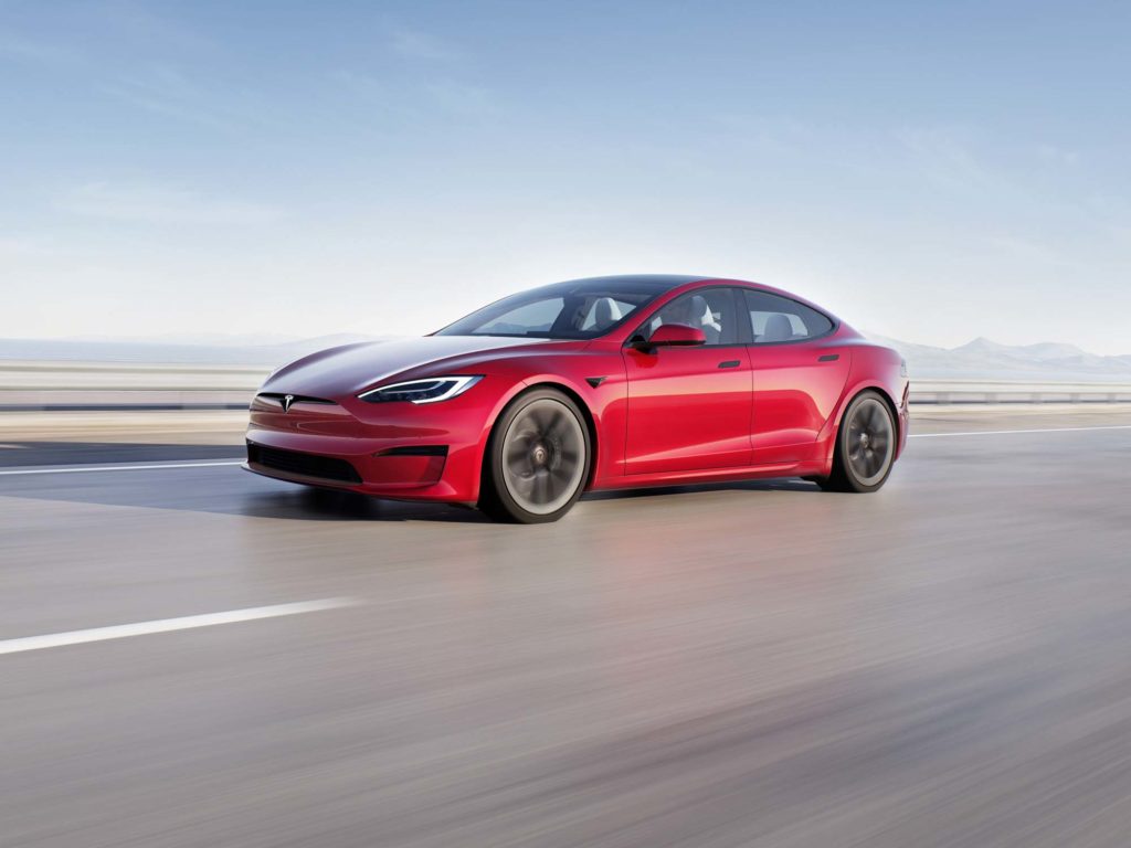 red tesla model s running