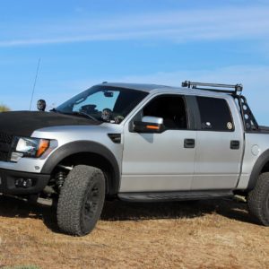 2011 ford f 150 raptor on dirt road