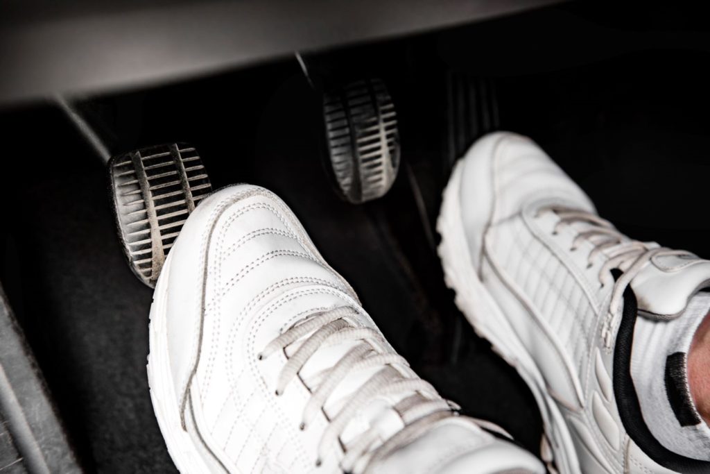 stepping on clutch pedal