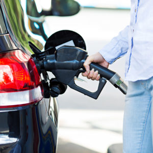 man holding a gas nozzle