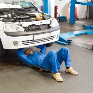 mechanic searches for oxygen sensor upstream