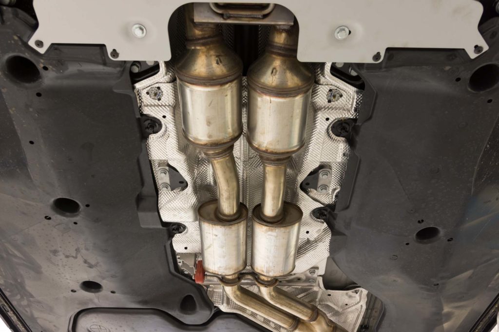 close up of exhaust system catalytic converters