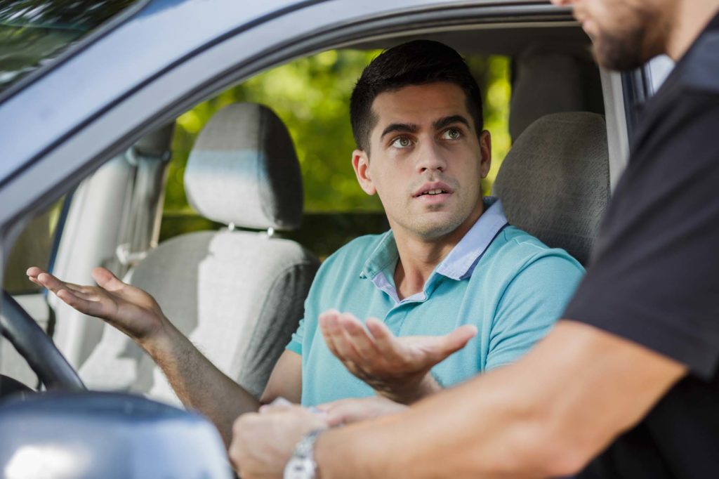 male driver pulled over by police over loud noise