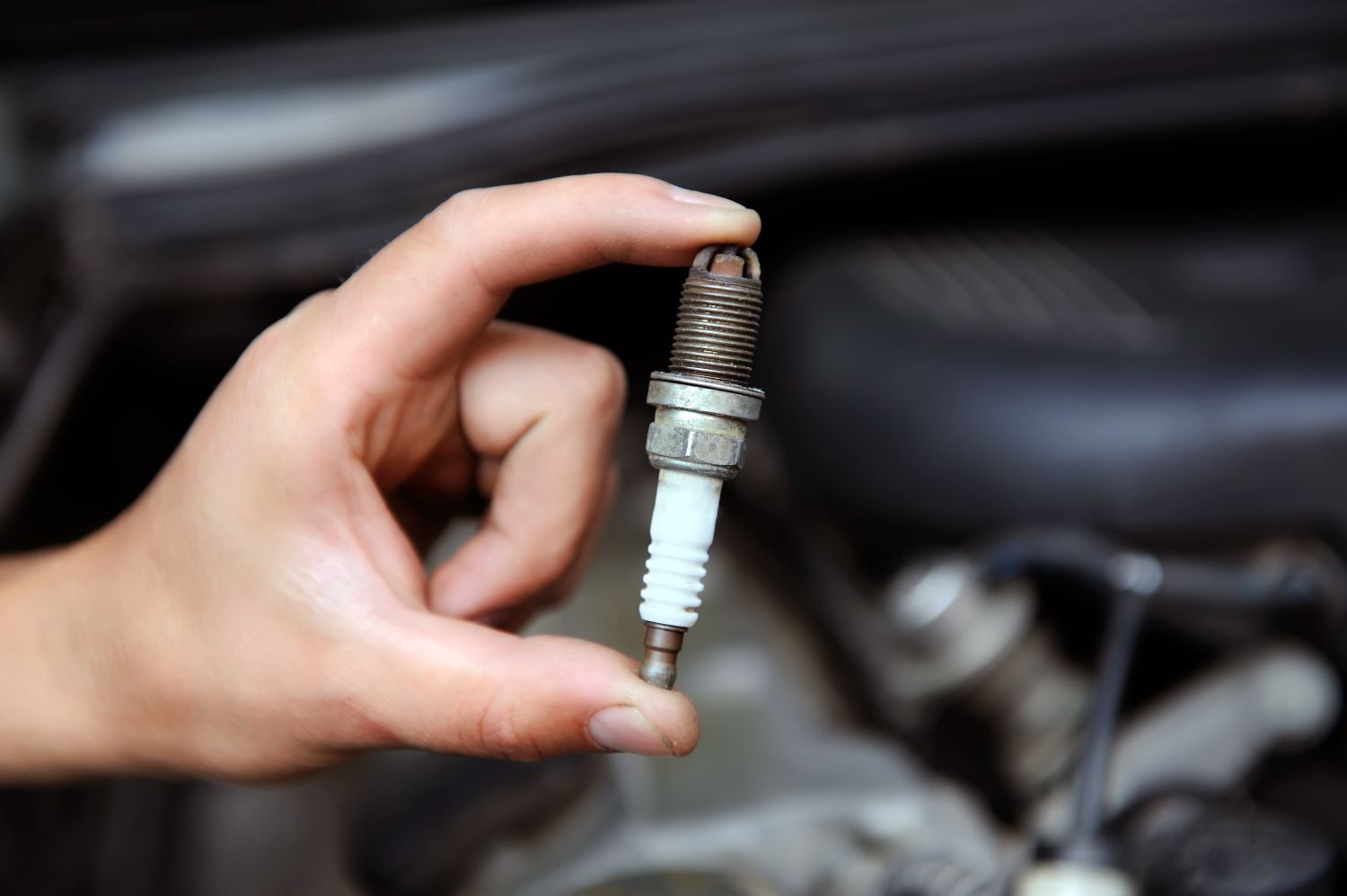 Can A Spark Plug Break A Window? In The Garage with