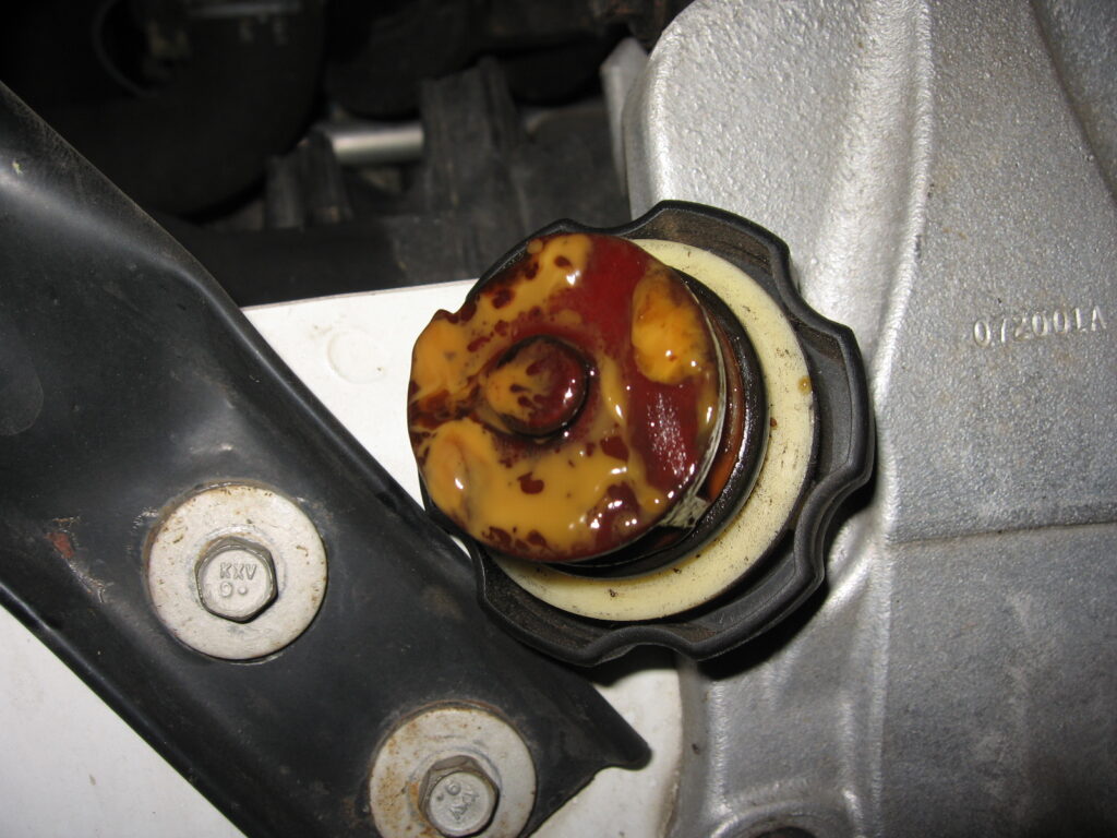 visible oil residue after oil filler cap removed