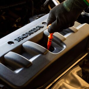 car honda engine undergoing tune up
