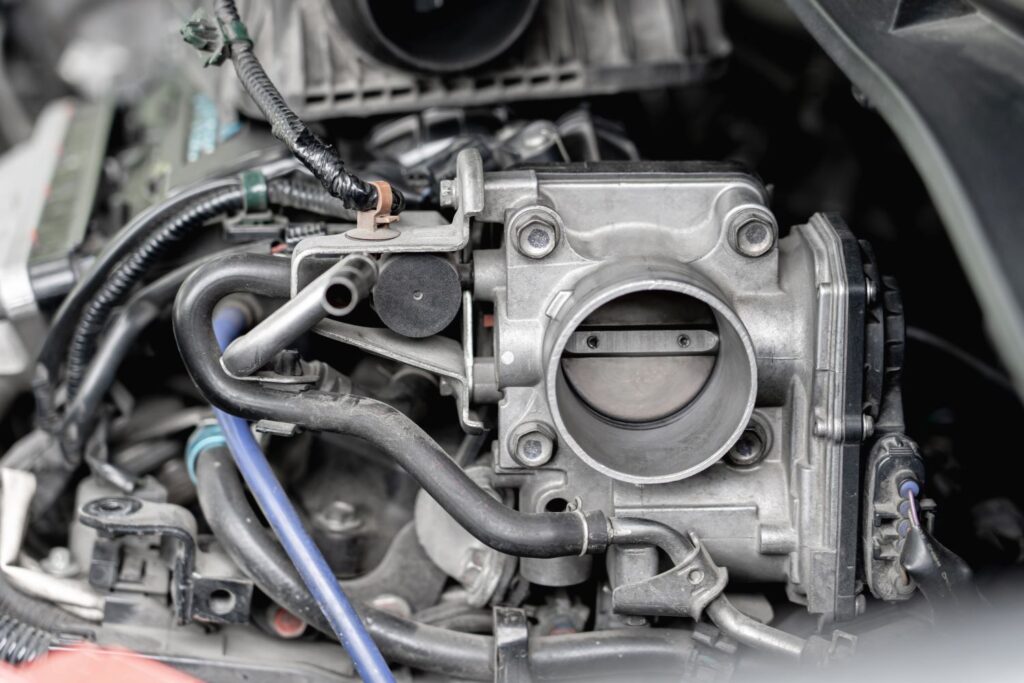Where is the Throttle in a Car Located?