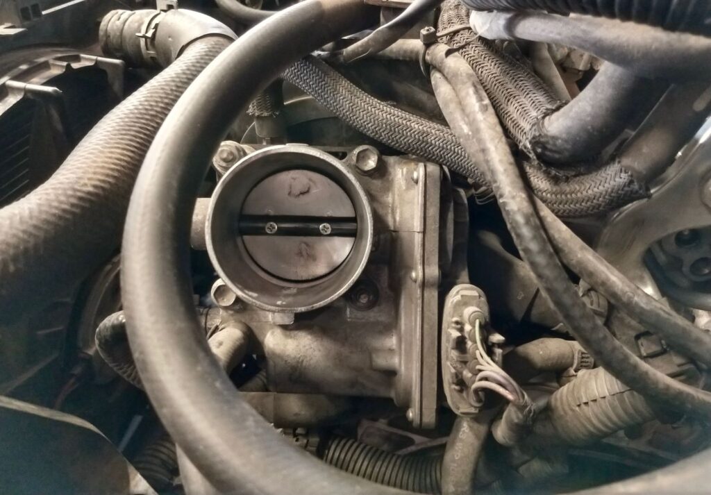 image of a throttle body in a car engine