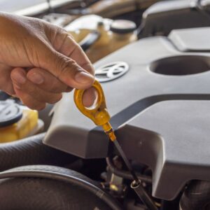 mechanic checking toyota engine