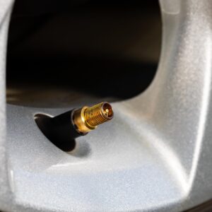 car tire valve stem visible